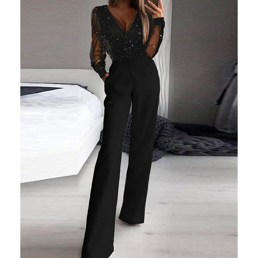 Kaye – Einteiler mit tiefem Ausschnitt und lockerer Hose